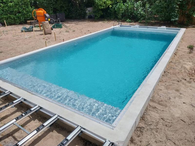 Construction d'une Piscine Traditionnelle Maçonnée de 7x3,5 m : Un Projet Réussi
