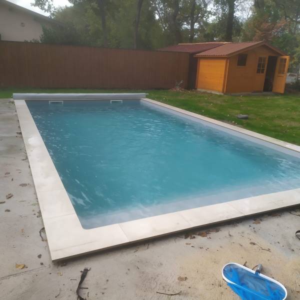 Piscine maçonnée,liner gris clair, margelles ton pierre sur Lege Cap Ferret